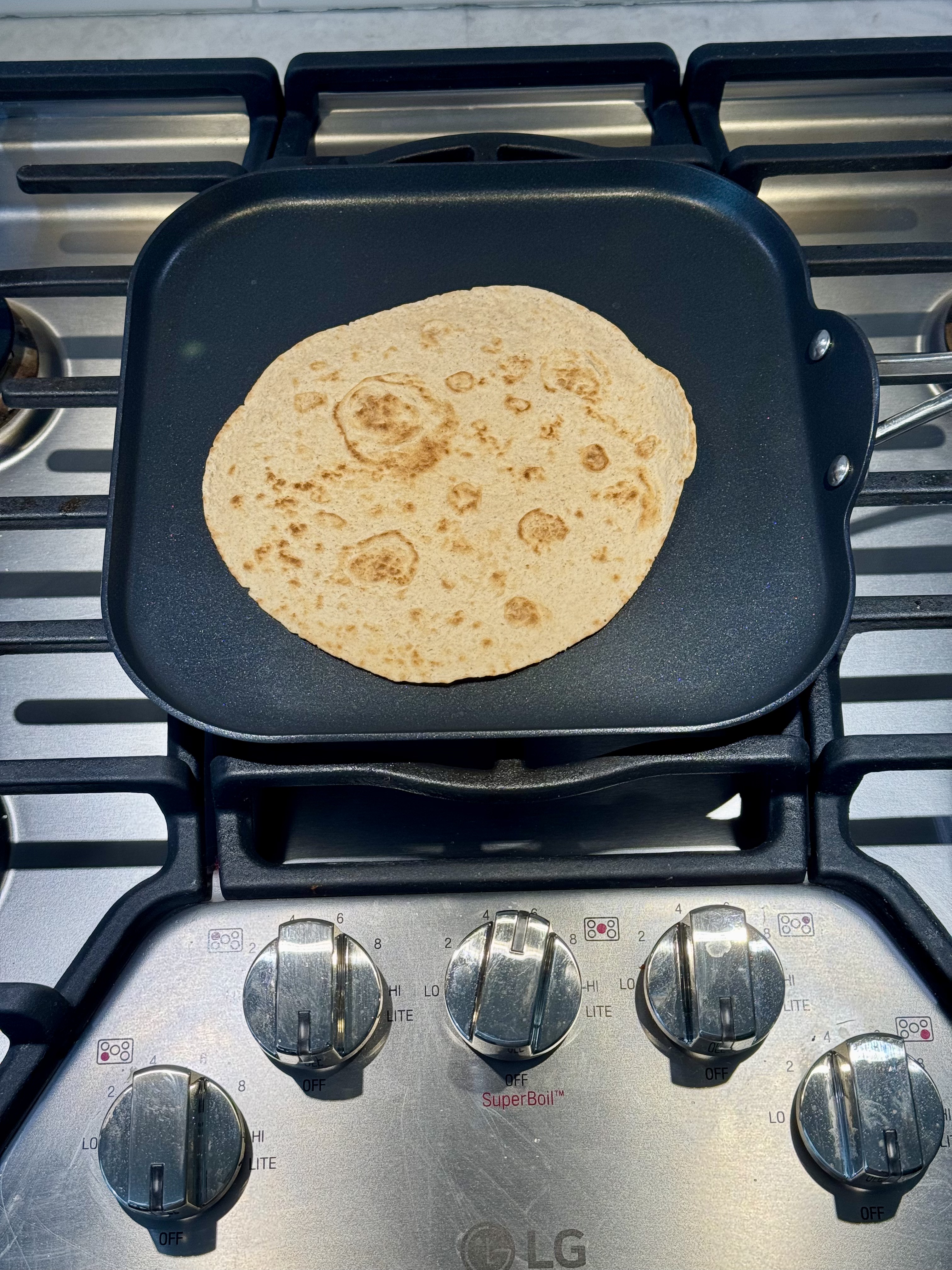 Tortilla toasting on the griddle